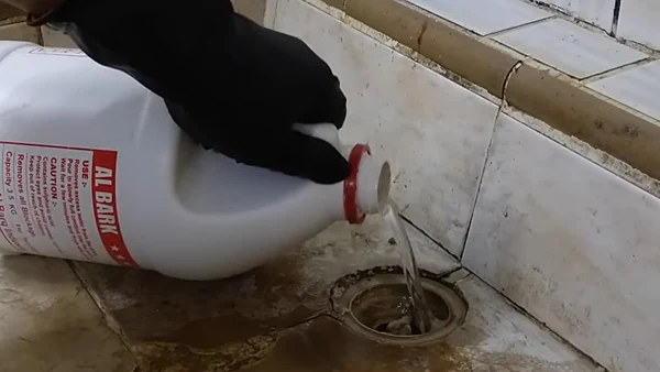 What acid do plumbers use to unclog drains