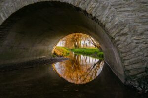 old stone arch bridge above a tranquil river 2025 02 05 10 31 04 utc